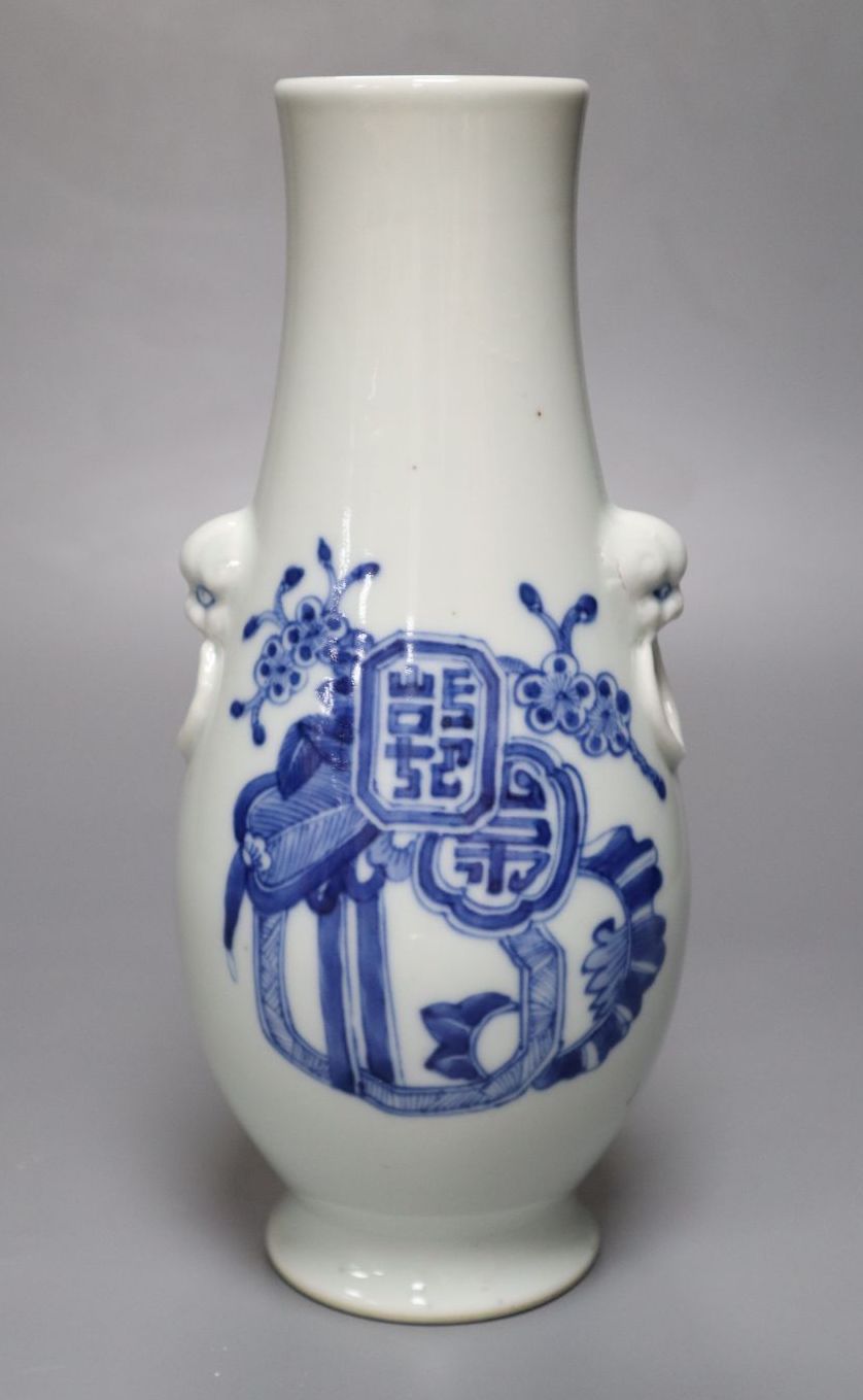 A Chinese porcelain vase, with moulded mask ring handles, 23cm